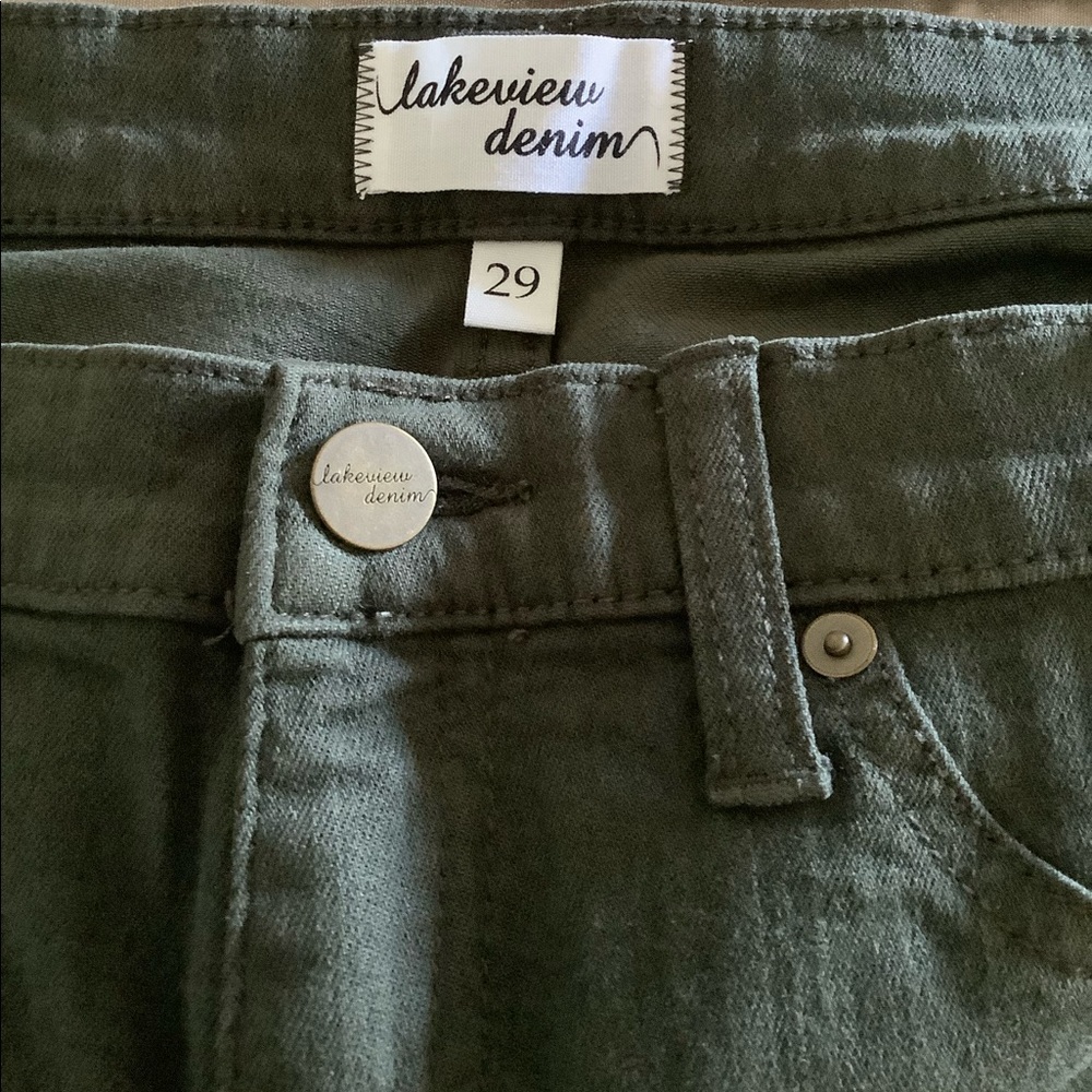 Women’s Olive Green, straight leg Mid- rise jeans.